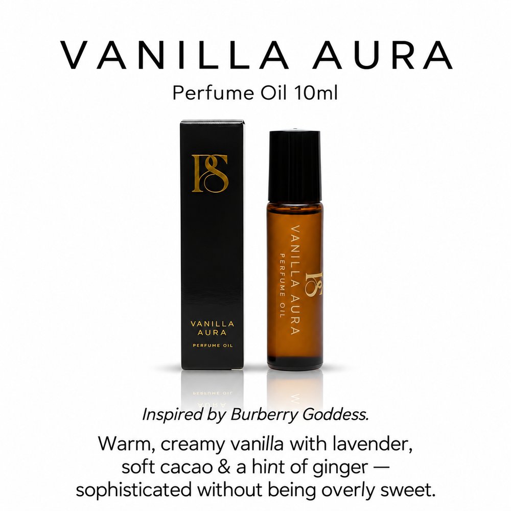 Vanilla Aura perfume oil 10ml in a dark amber glass bottle with a black cap, shown next to its black packaging box with gold lettering. The image features descriptive text above and below the product on a clean white background.